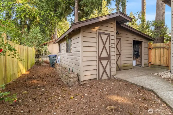 The roomy storage shed has both water and electricity!