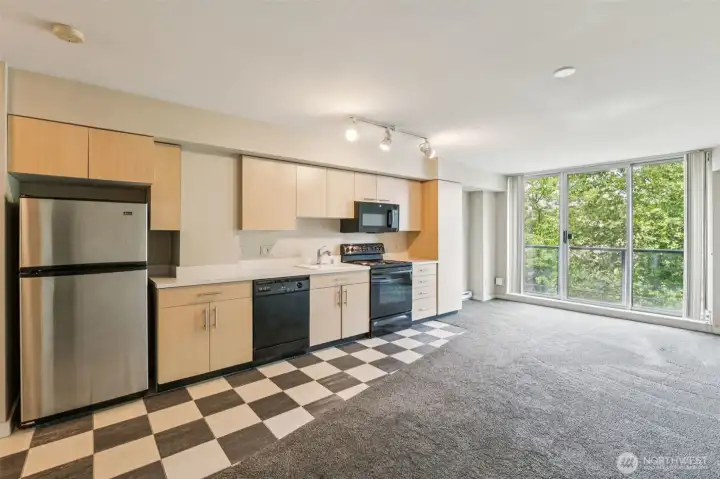 Discover your peaceful escape in the city—an urban retreat with a private, tree-lined view nestled in vibrant downtown Bellevue.