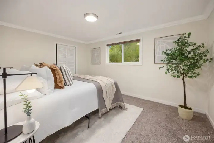 Primary bedroom with walk-in closet.