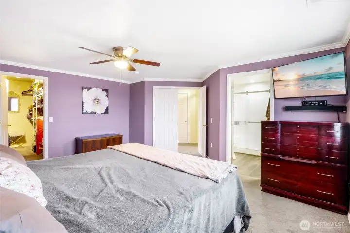 Large walk-in closet with organizers.