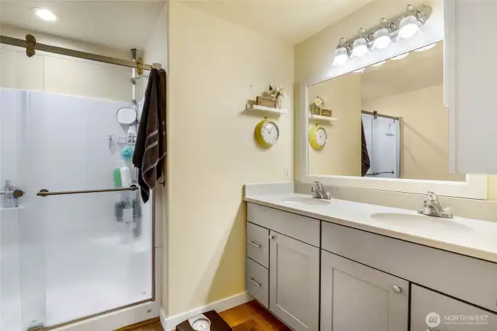 Updated primary bath with dual sinks.