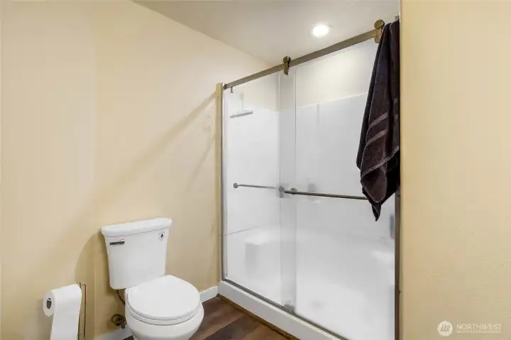 Walk-in shower in primary bath.