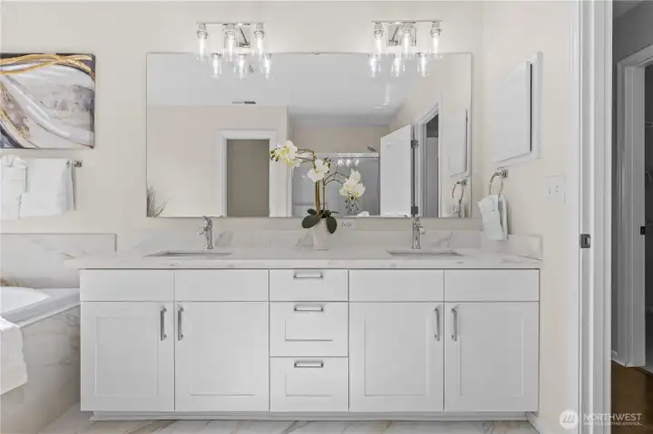 Dual sinks and full-size shower.