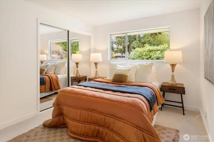 West home - 22511: Generous primary bedroom with sliders to the large deck.