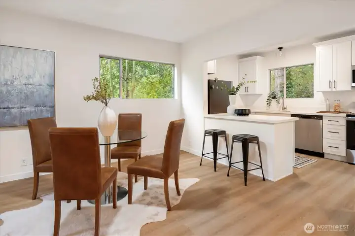 East Cottage - 22511 1/2: The open floor plan includes the new kitchen open to the living and dining room.