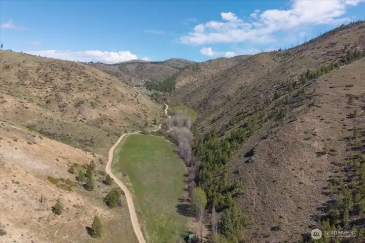 Looking up Bisping Canyon. There are more full time residents above this property.