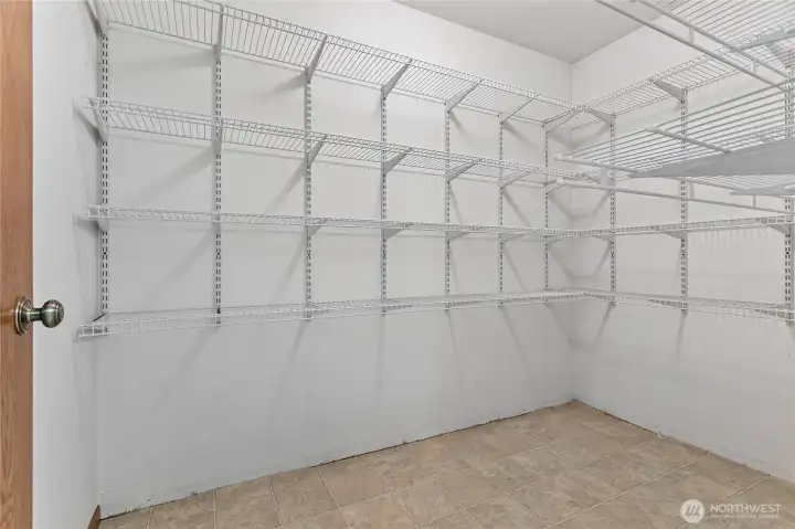 Huge closet for extra storage off of the utility room.