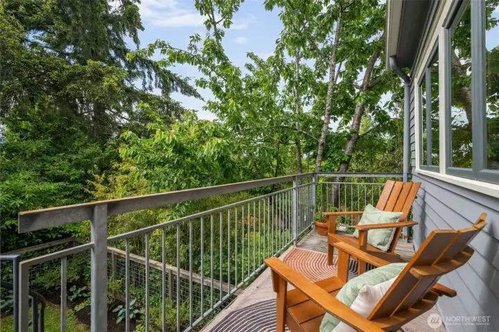 Deck off the kitchen overlooking backyard