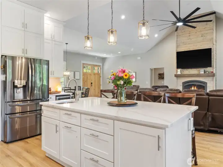 The Chef has a full view and ability to be actively engaged with the activities in the Great Room or dining area. The Chef has a full view and ability to be actively engaged with the activities in the Great Room or dining area.