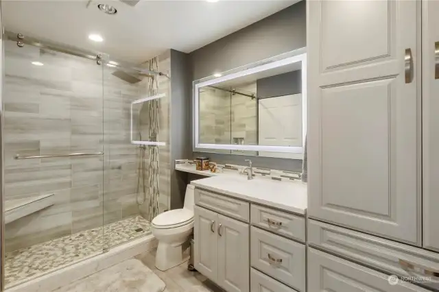 Check ut this custom bathroom, with expansive storage, all soft close.