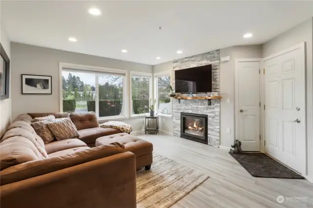 A chilly PNW day?  Enjoy the ambiance of a gas fireplace and the elegance of a custom live edge mantle