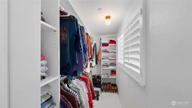 Ample primary walk-in closet