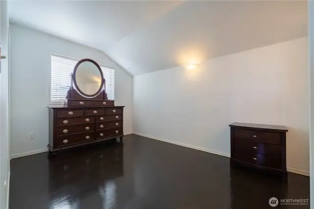 Tucked away on the second level, this primary bedroom offers space, comfort, and relaxation.