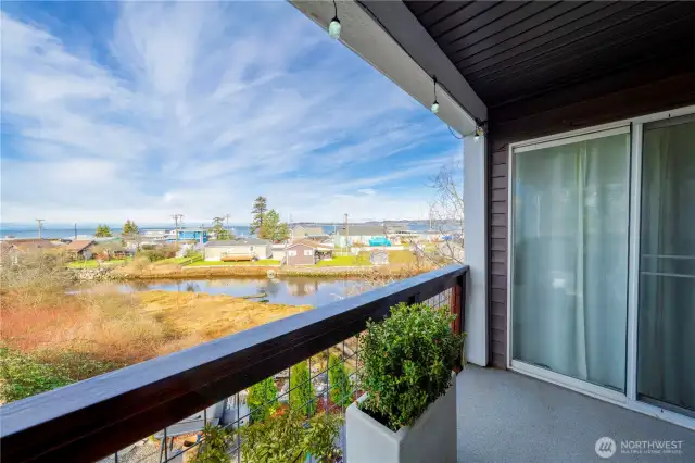 Enjoy morning coffee or sunset drinks on the deck while overlooking beautiful Birch Bay.