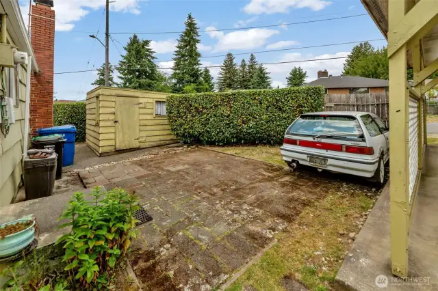 You can park another car beside the detached carport