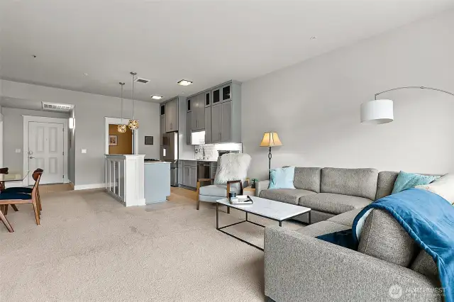 The open floor plan ensures a seamless transition between the living, dining and kitchen area perfect for entertaining.