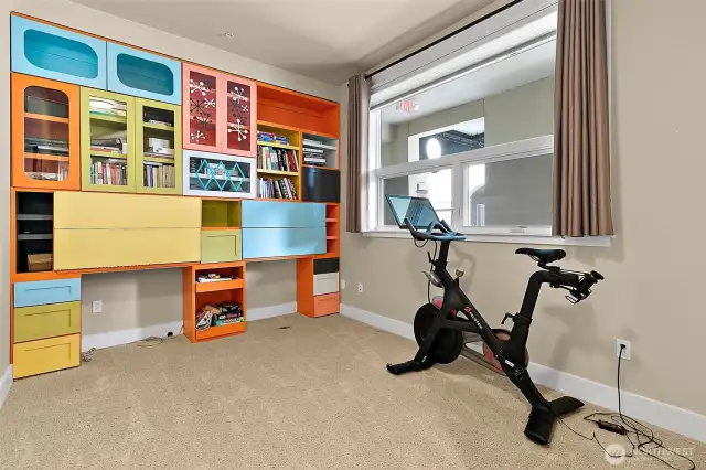 Work from home?  This guest bedroom has plenty of built-ins that maximize storage and enhance the room's sleek modern aesthetic.