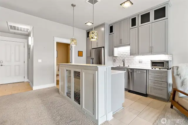 These glass - front cabinets not only enhance the kitchen's aesthetic appeal they also offer a perfect display space for your cherished collectibles.