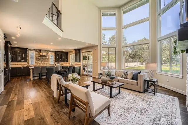 Kitchen, eating nook, and family room combine to create a warm, inviting great room experience.