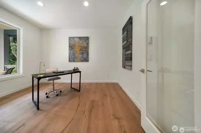 Office with glass French door.