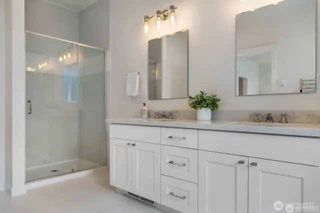 1st primary full bath, dual sinks and towel warmer.