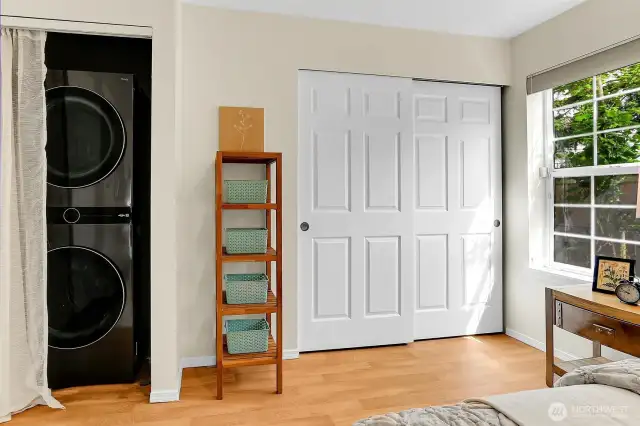 Bedroom closet and laundry area