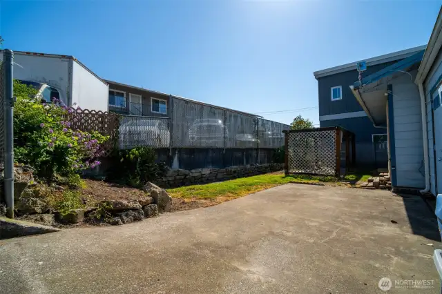 Backside, showing fully paved park or work pad.