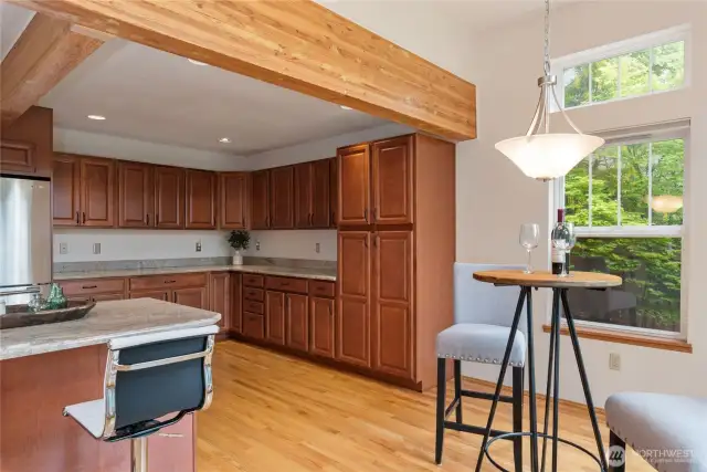 Additional kitchen cabinet space to accommodate pots, pans, food items, and dishes.