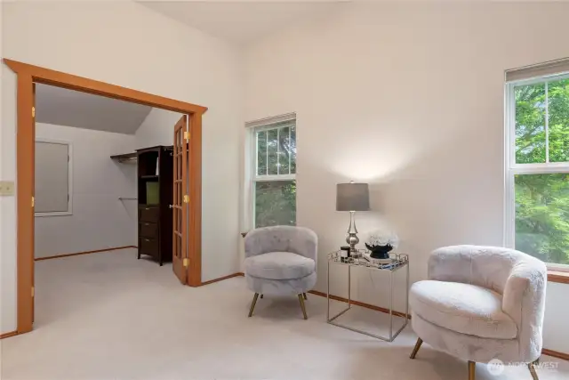 Spacious seating area designed to accommodate a couch, chairs, and provide a comfortable environment for relaxation.