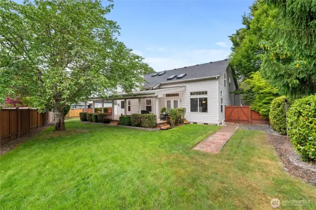 Access to the backyard is available via gates located on the side of the home.