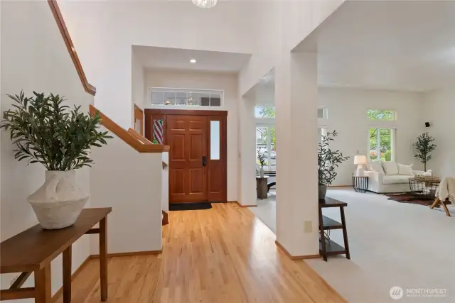 Vaulted entry with real hardwood floors.