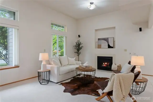 Gas fireplace enhances living room.