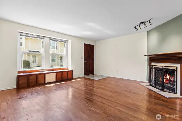 Step into Living Room with Hardwood Floors & Bright Bay Window~