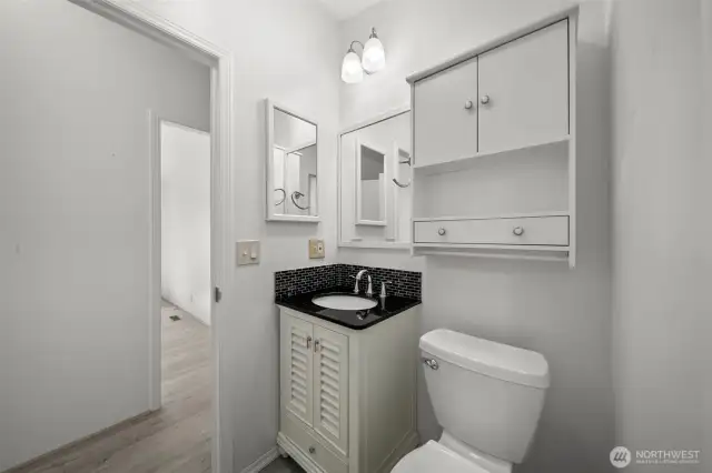 Full hallway/guest bathroom that has been updated.