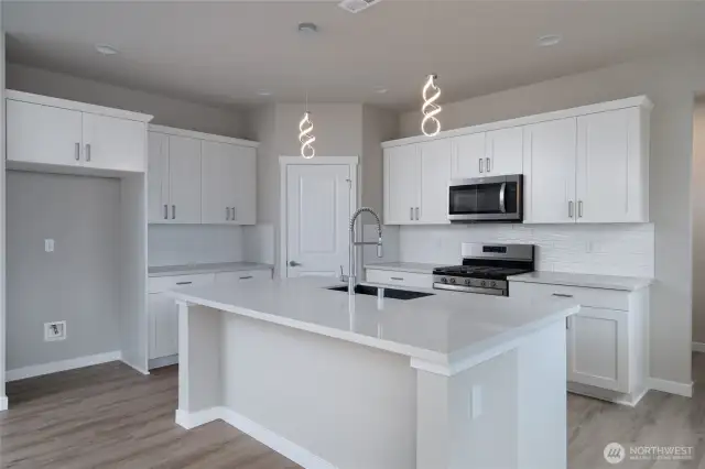 Photos are of another home in the community and are for illustration purposes only to reflect typical finishes.  May depict seller enhancements.  Colors and options may vary.