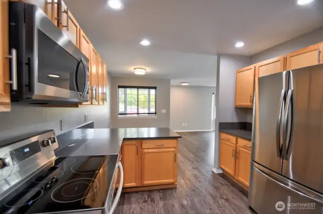 Stainless Steel newer appliances, Quartz Countertops and Easy Care Vinyl Plank Flooring!