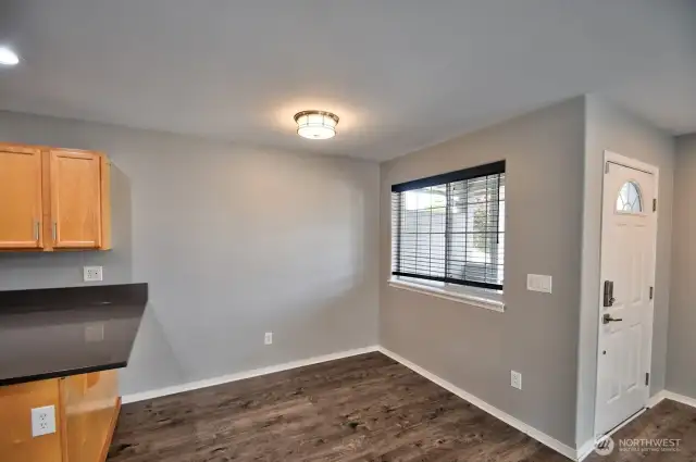 Another Angle of the Dining Room and Entry, front door.