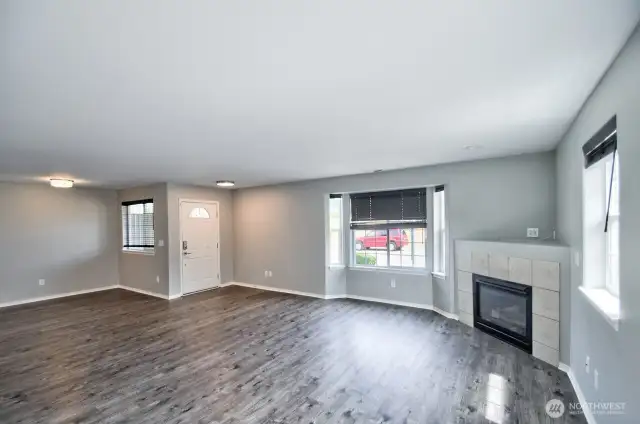 Great Room showing the front door and Dining area. A great open floor plan.