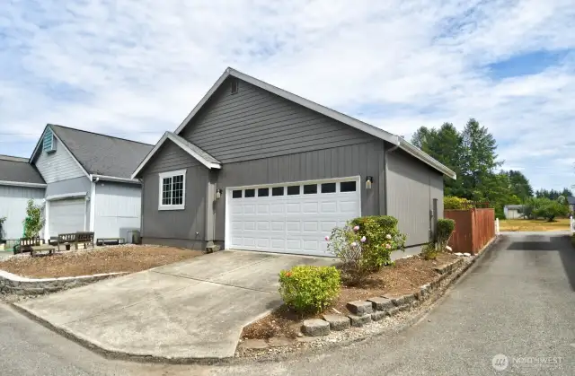 Showing the Garage door and alley to the back.