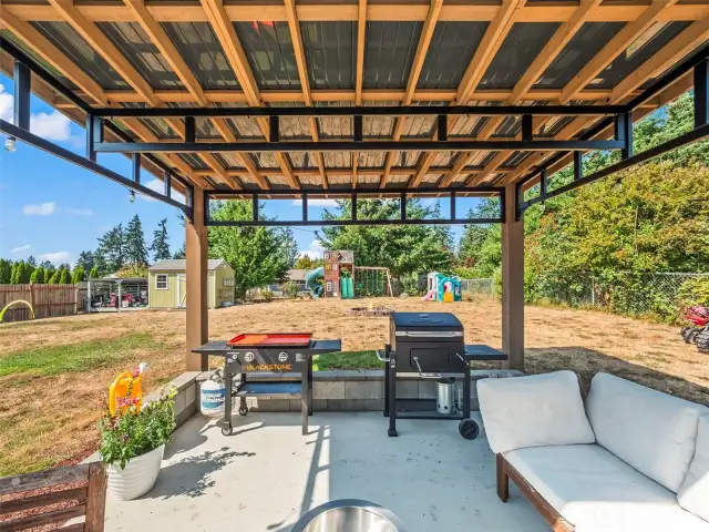 All structures/outbuildings in the back yard are included - including play structures