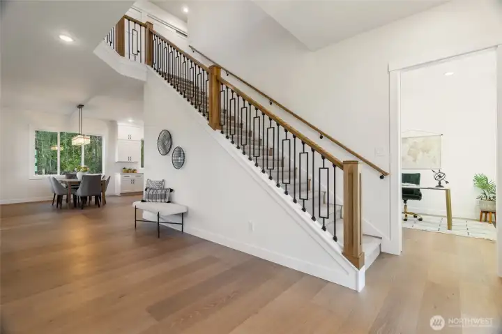 Enter into this Incredible Foyer, 10' Ceilings, Custom Staircase & Wood Floors Throughout ...