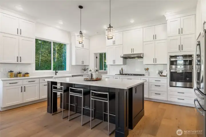 Enter the Gourmet Kitchen & Look at this Incredible Oversized Island ...