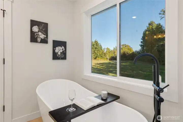 Primary Bath with Endless Views from this Spa Soaking Tub ...
