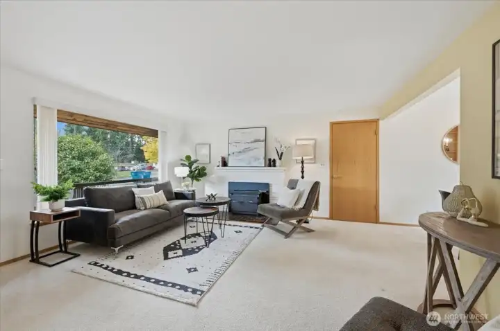 Cozy wood-burning fireplace.