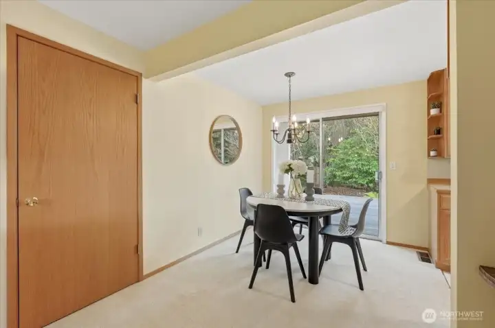 Dining room opens to spacious back yard Brazilian hardwood deck.