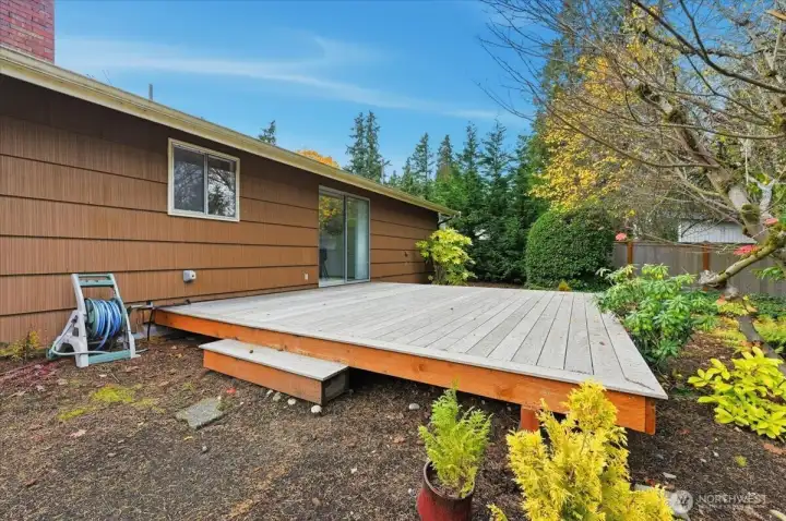 Back yard with spacious Brazilian hardwood deck.
