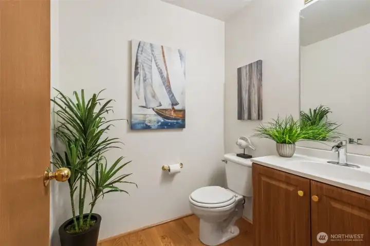 Half bath conveniently located near the front door.