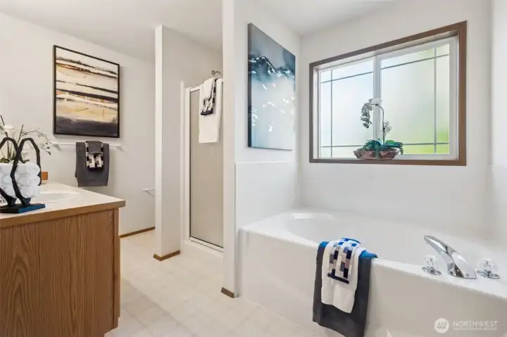 Primary bedroom features an ensuite full bath.