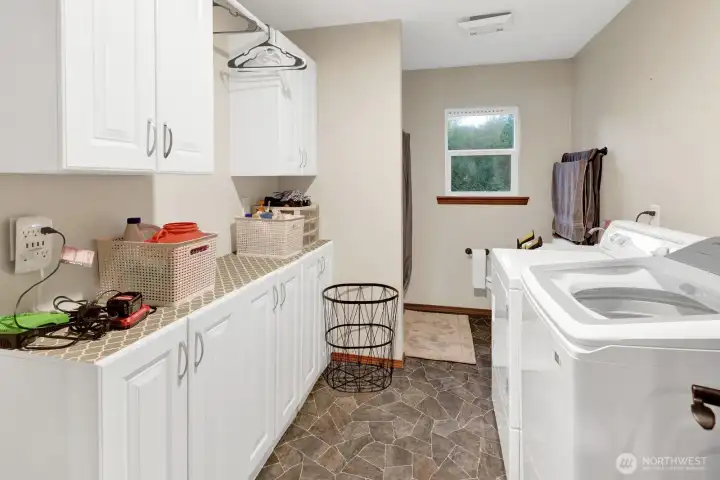 Laundry room with 1/2 bath.