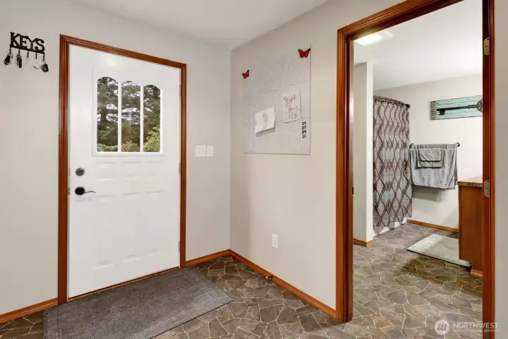 Full bathroom off the rear entry.